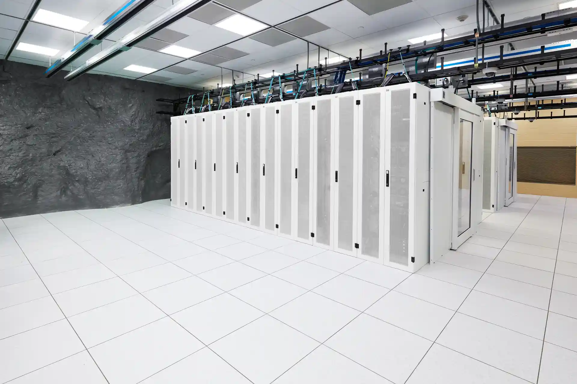 contained data center server pods with overhead cable management