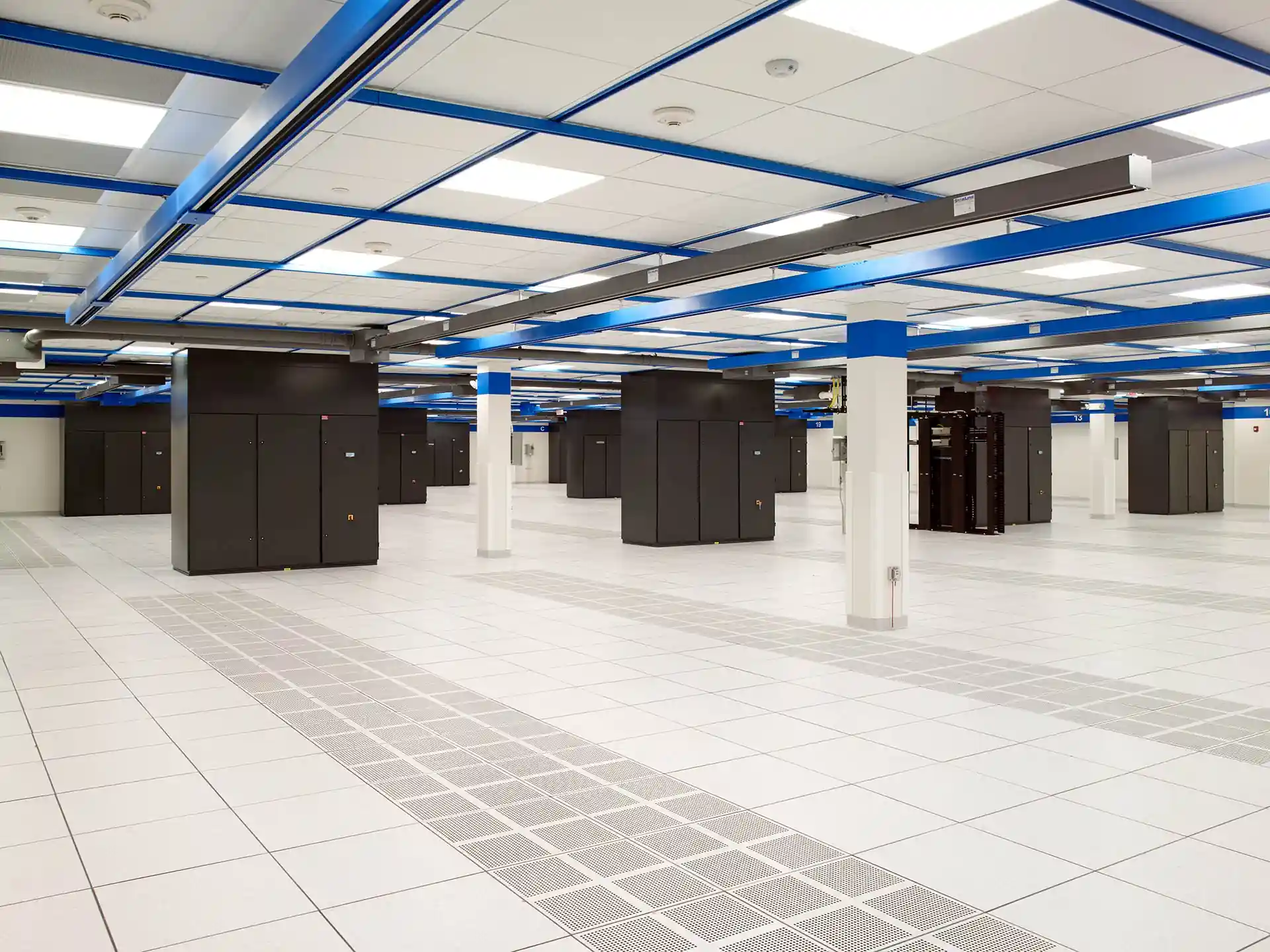empty data center white space with server cabinets
