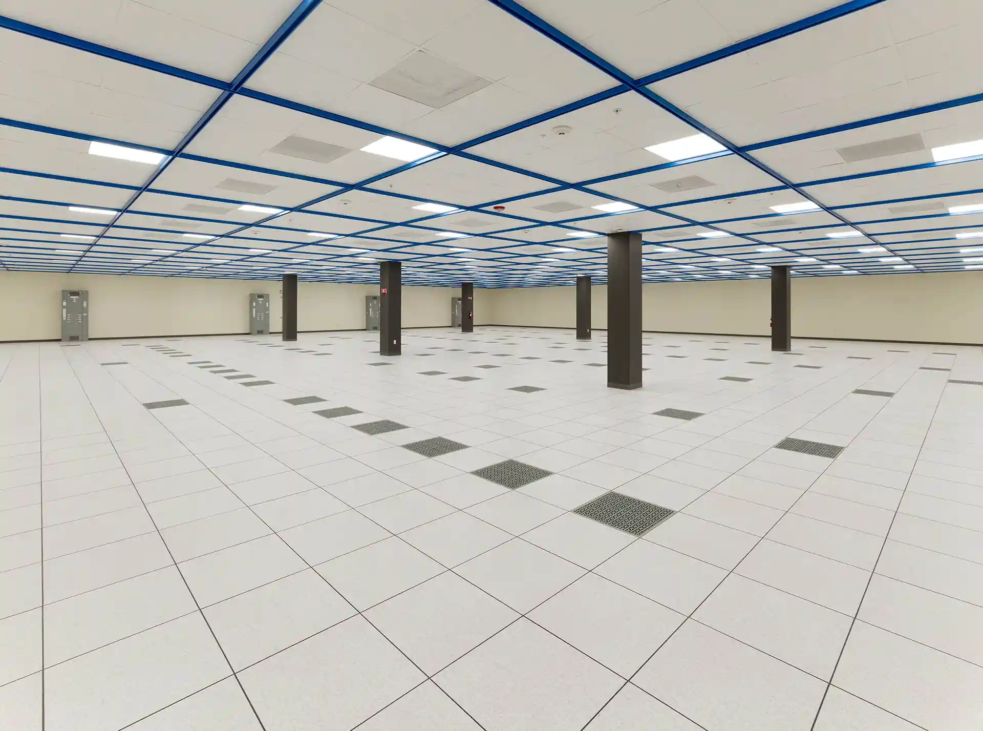 empty data center white space with raised floor